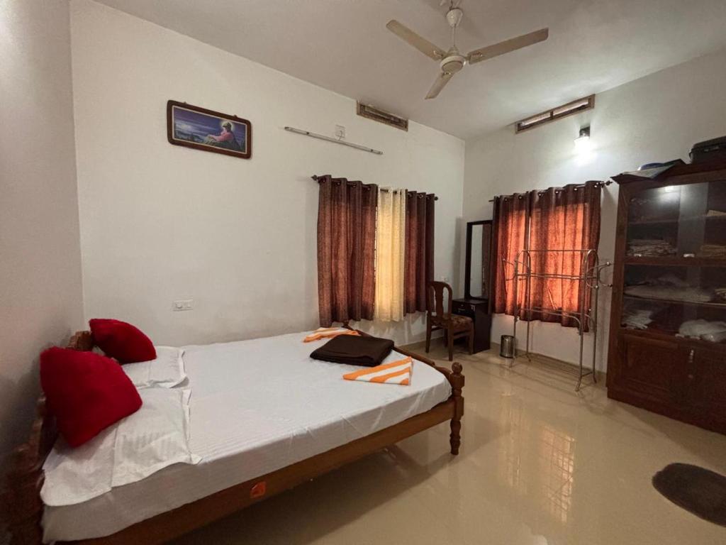 Postel nebo postele na pokoji v ubytování Casa Grande Homestay Anaviratty Munnar