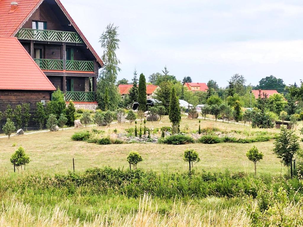 Vonkajšia záhrada v ubytovaní Mazurska Chata jezioro i aquapark 6 min, centrum i promenada 12 min