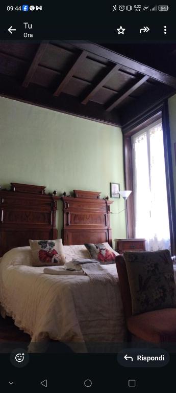 Postel nebo postele na pokoji v ubytování B&B Amarantha Gothica Genoa
