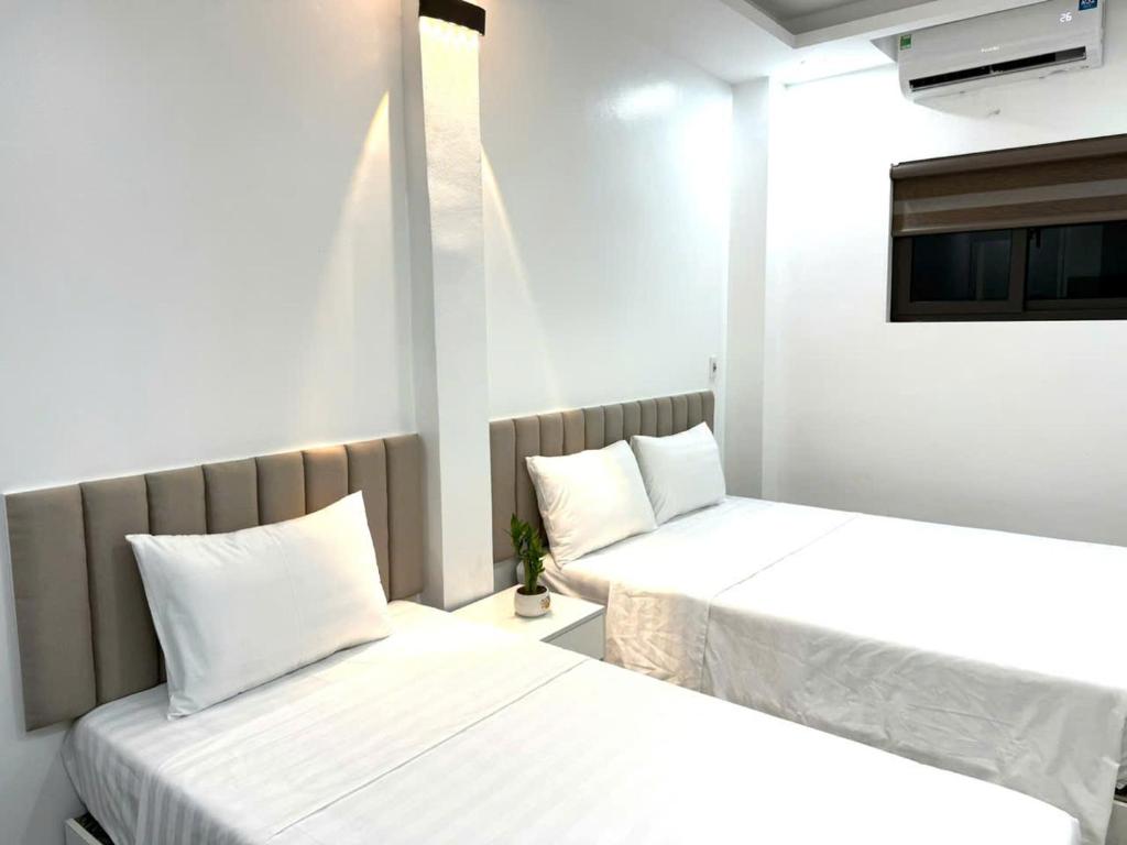 Postel nebo postele na pokoji v ubytování The Queen Hotel & Spa 2