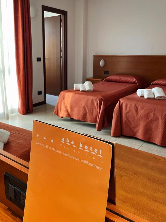 Postel nebo postele na pokoji v ubytování Aba Hotel