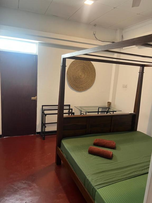 Postel nebo postele na pokoji v ubytování Hari Hari Hostel