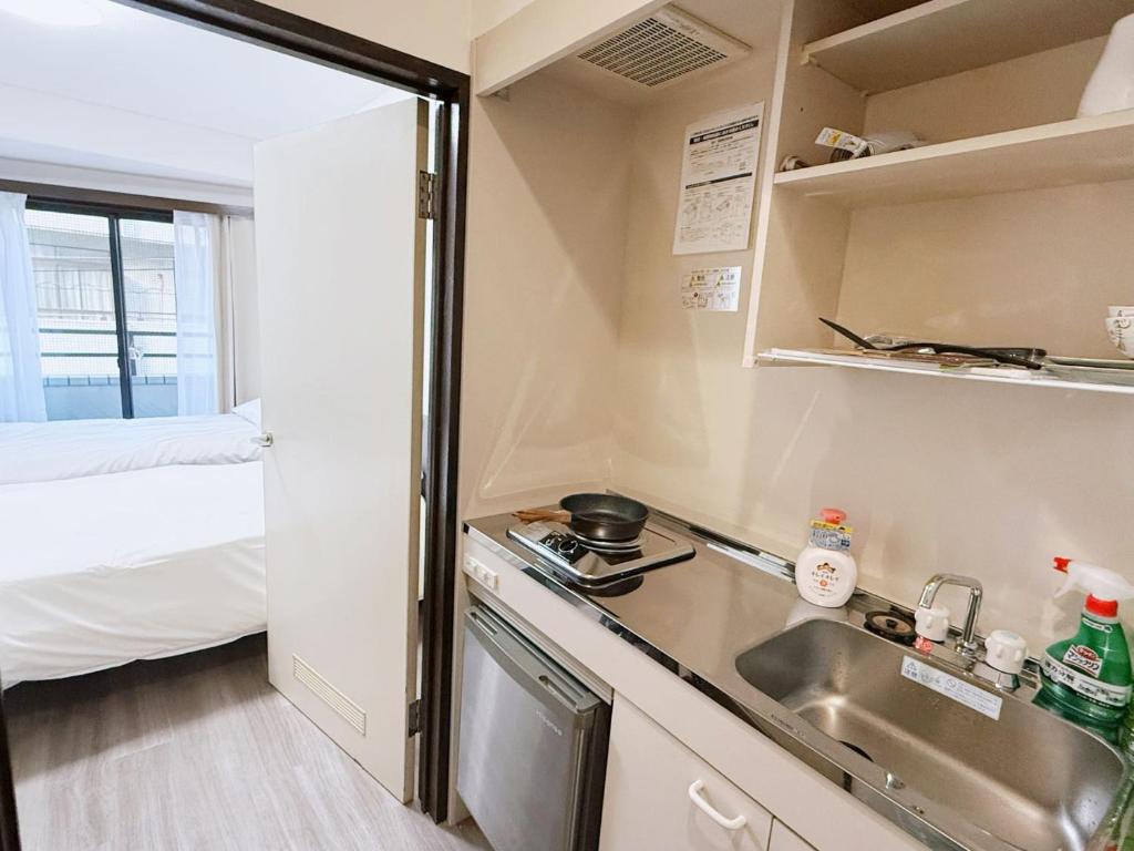 Kuchyň nebo kuchyňský kout v ubytování Tokyo Shinjuku Waseda House新宿早稲田