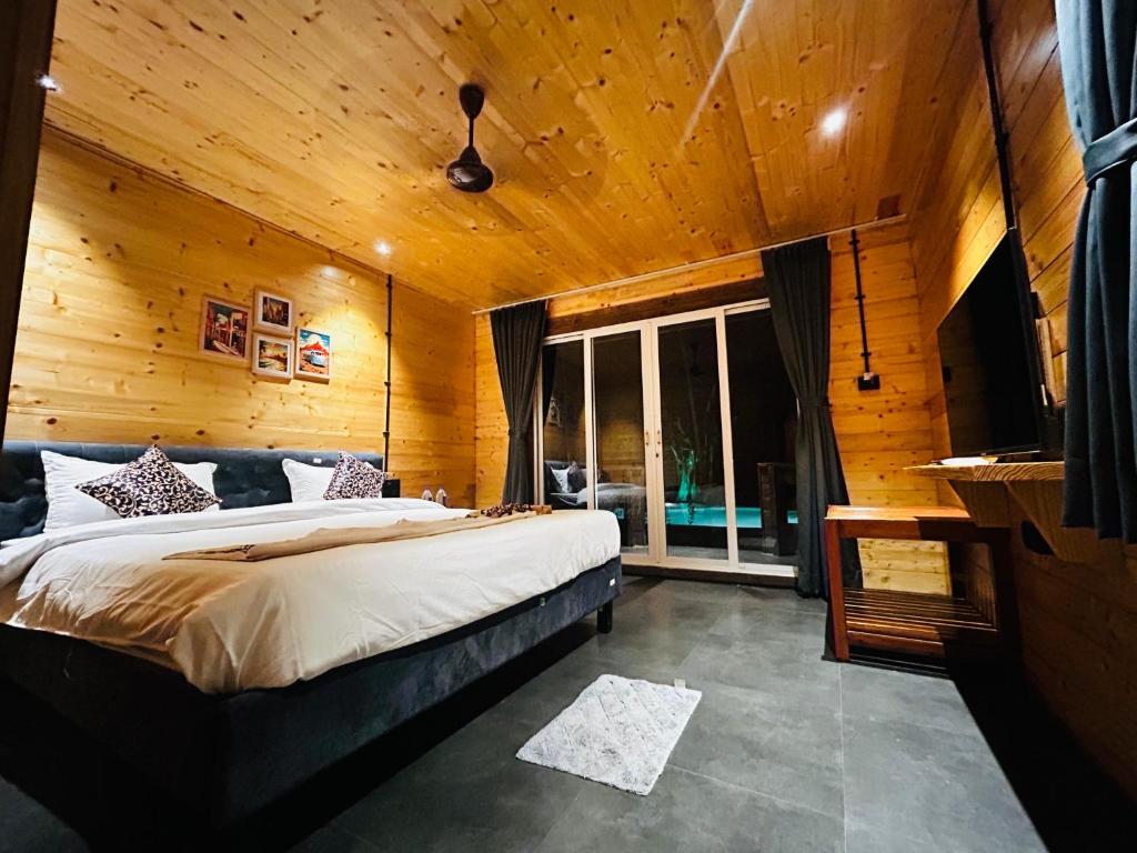 Postel nebo postele na pokoji v ubytování Seclude Eco Cottages