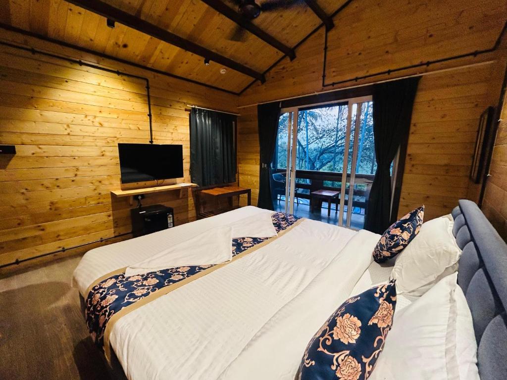 Postel nebo postele na pokoji v ubytování Seclude Eco Cottages