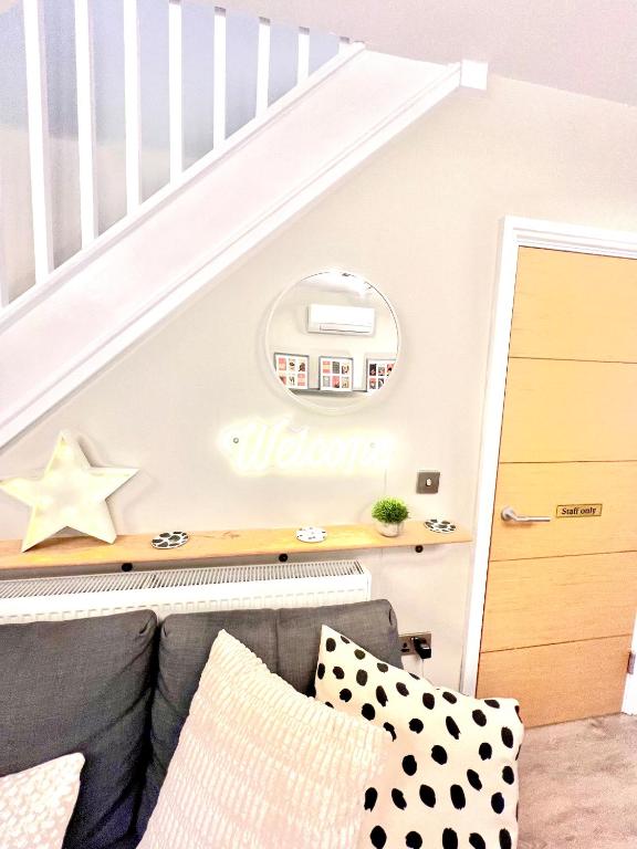 a childs room with a bed and a staircase at The Duplex Margate with Deck & Living Space Air Conditioning in Margate