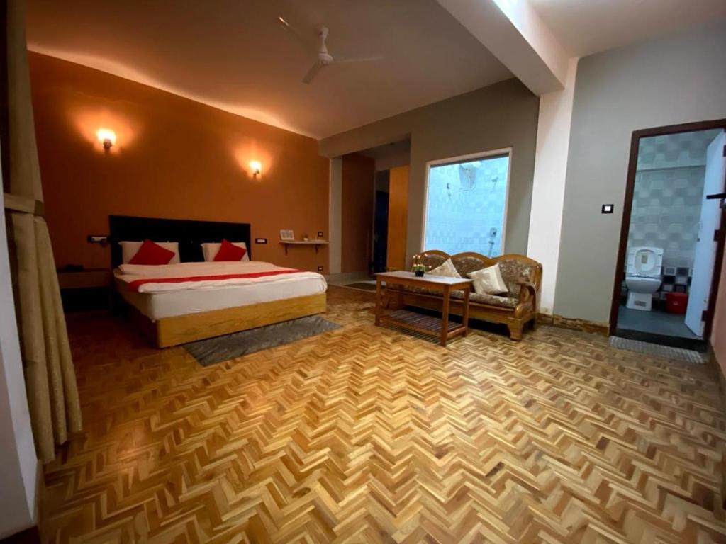 Postel nebo postele na pokoji v ubytování Hidden Gem Residency