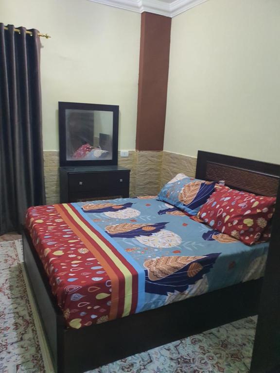 Postel nebo postele na pokoji v ubytování Abeer Suites 4 basement