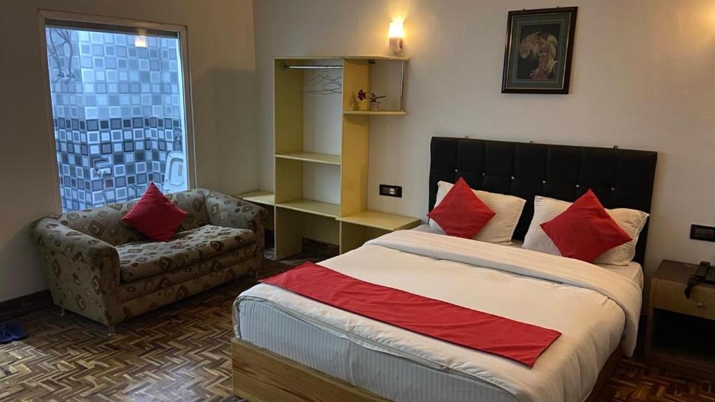 Postel nebo postele na pokoji v ubytování Hidden Gem Residency