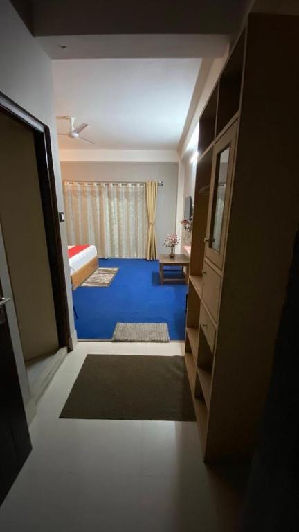 Postel nebo postele na pokoji v ubytování Hidden Gem Residency