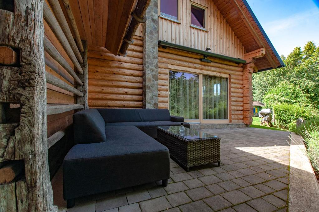 Posezení v ubytování Log House Natura