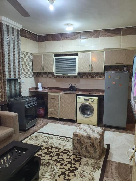 Kuchyň nebo kuchyňský kout v ubytování Abeer Suites 4 basement