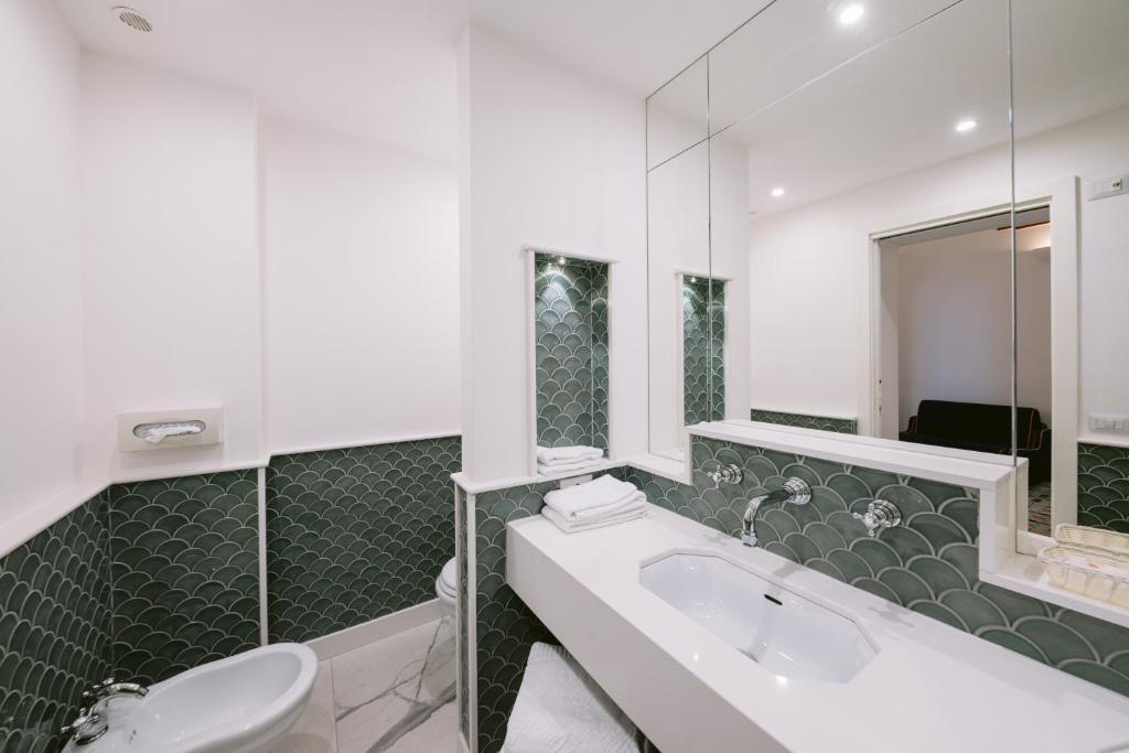 Koupelna v ubytování Hotel Giordano