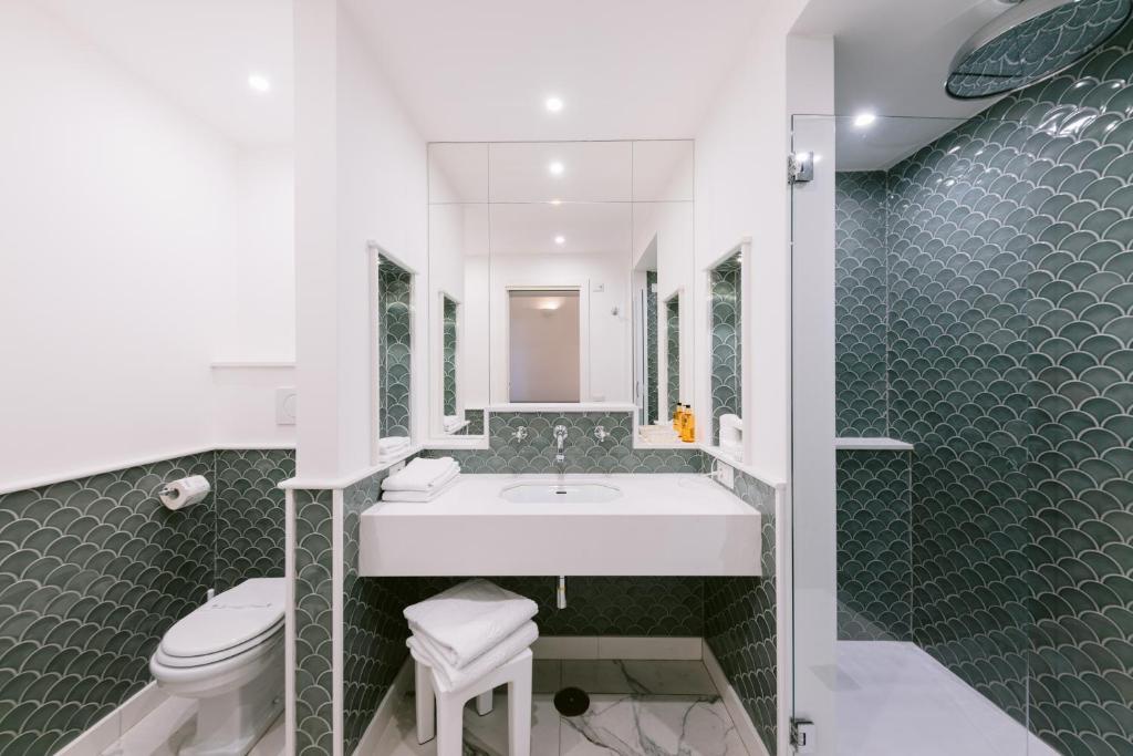 Koupelna v ubytování Hotel Giordano