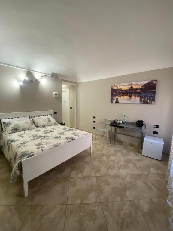Postel nebo postele na pokoji v ubytování ROMA PARADISO GUEST HOUSE