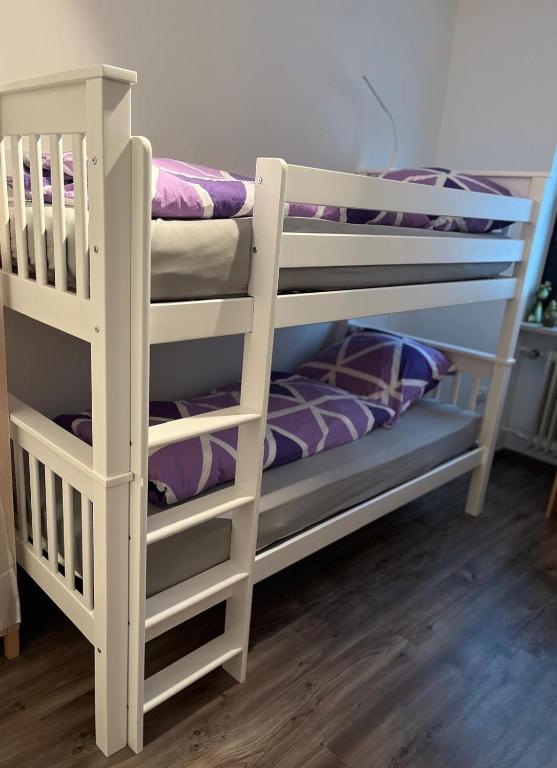 Postel nebo postele na pokoji v ubytování Ferienwohnung in der fränkischen Schweiz