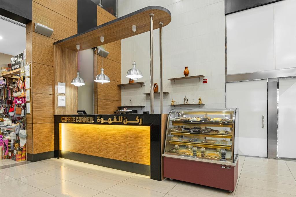Kuchyň nebo kuchyňský kout v ubytování Elaf Bakkah Hotel