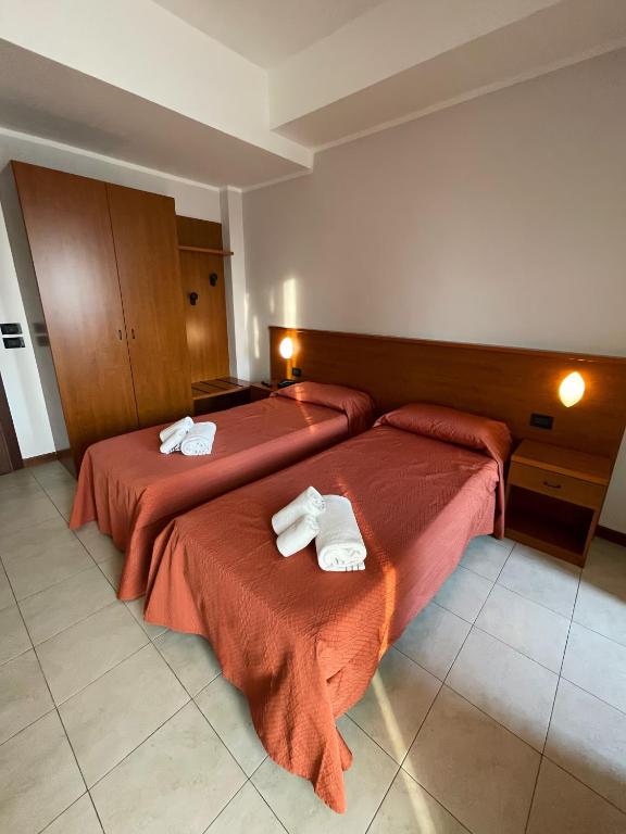 Postel nebo postele na pokoji v ubytování Aba Hotel