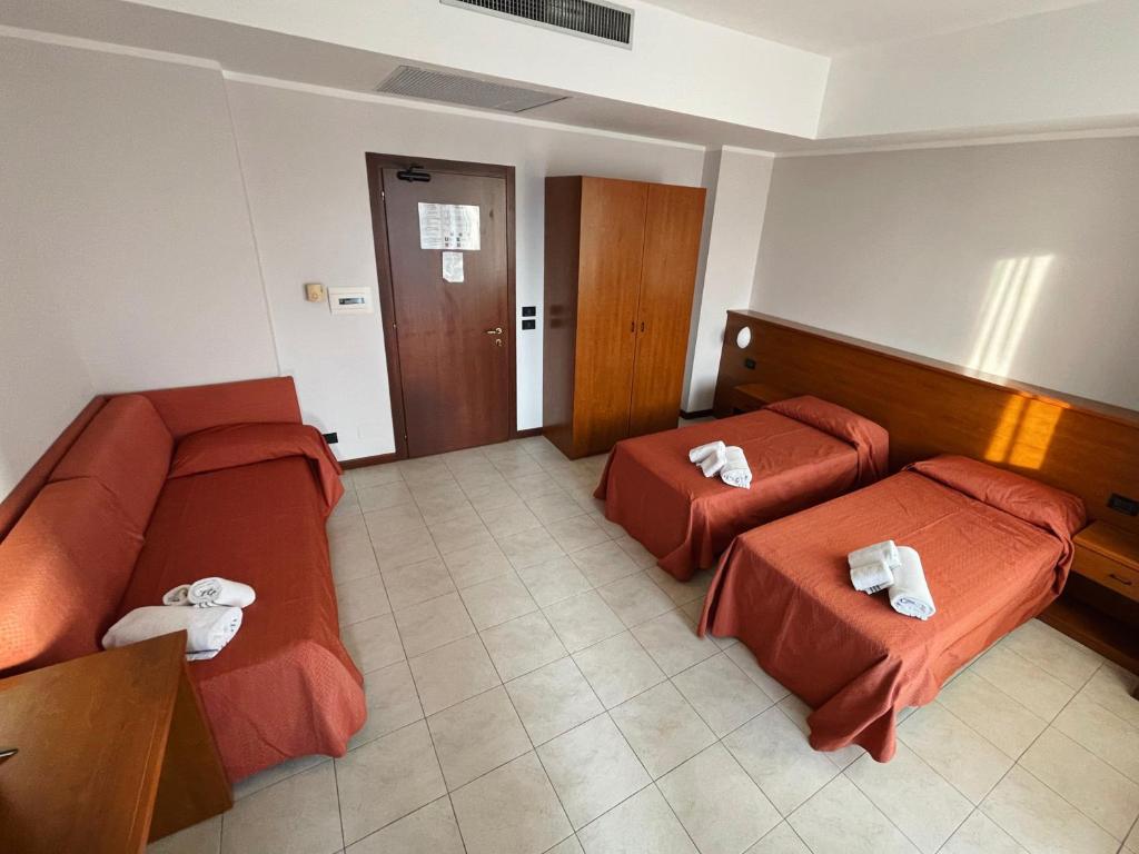Postel nebo postele na pokoji v ubytování Aba Hotel