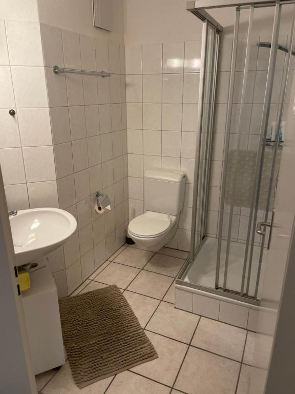 Koupelna v ubytování Zimmer mit privatem Badezimmer in guter Lage