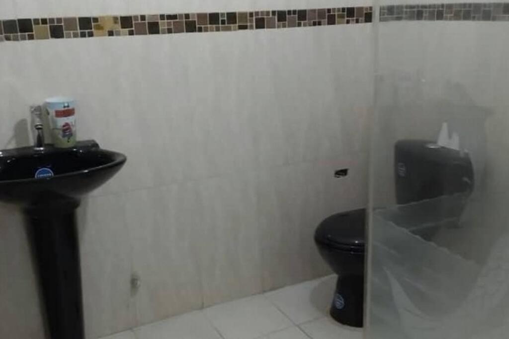 Ένα μπάνιο στο Alquilo hermosa casa