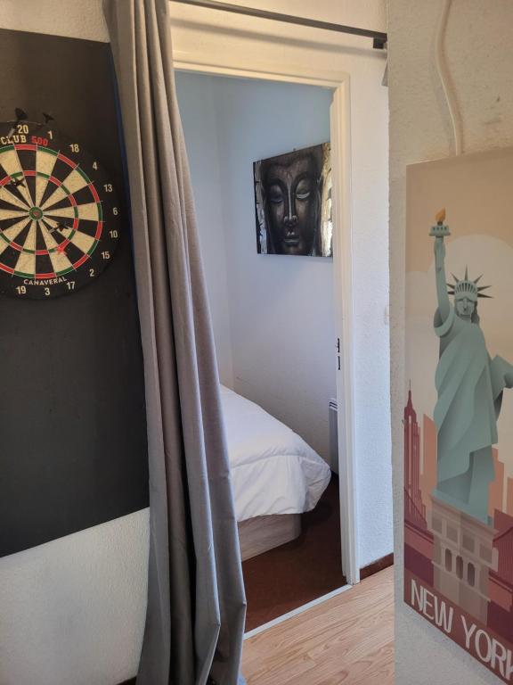 Postel nebo postele na pokoji v ubytování appartement rénové avec une magnifique vue