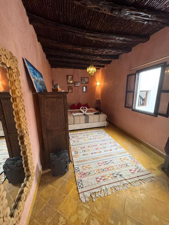 Postel nebo postele na pokoji v ubytování Riad Dar Abi