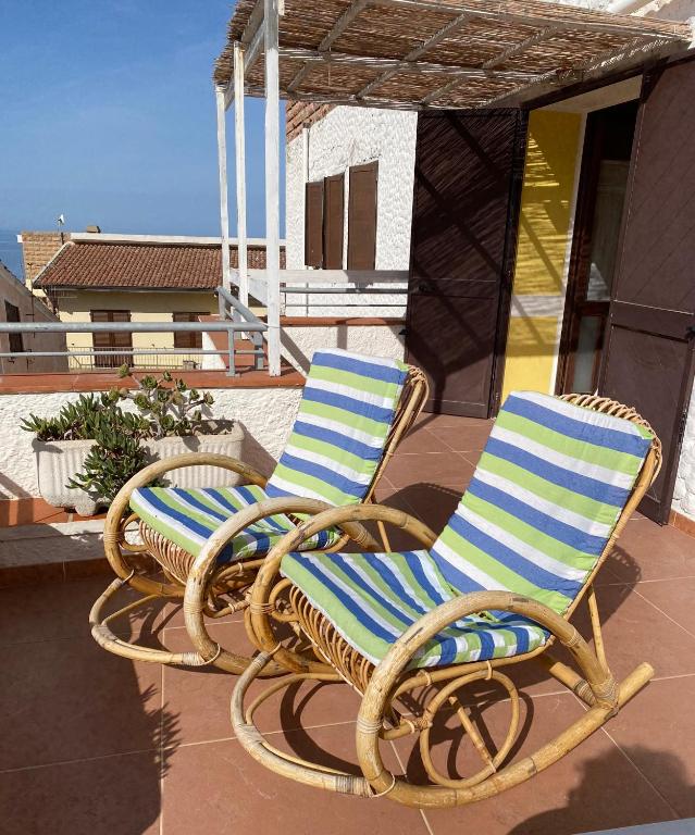 A balcony or terrace at Alabe Hotel Marina di Tresnuraghes