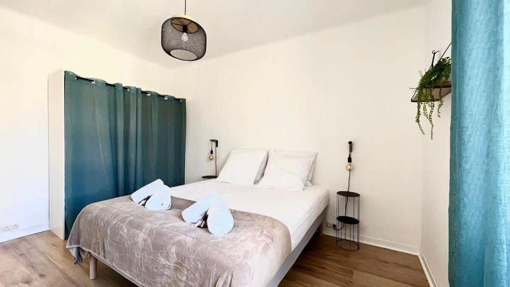 Posteľ alebo postele v izbe v ubytovaní T2 avec balcon au coeur de Ajaccio - Clim & Wifi