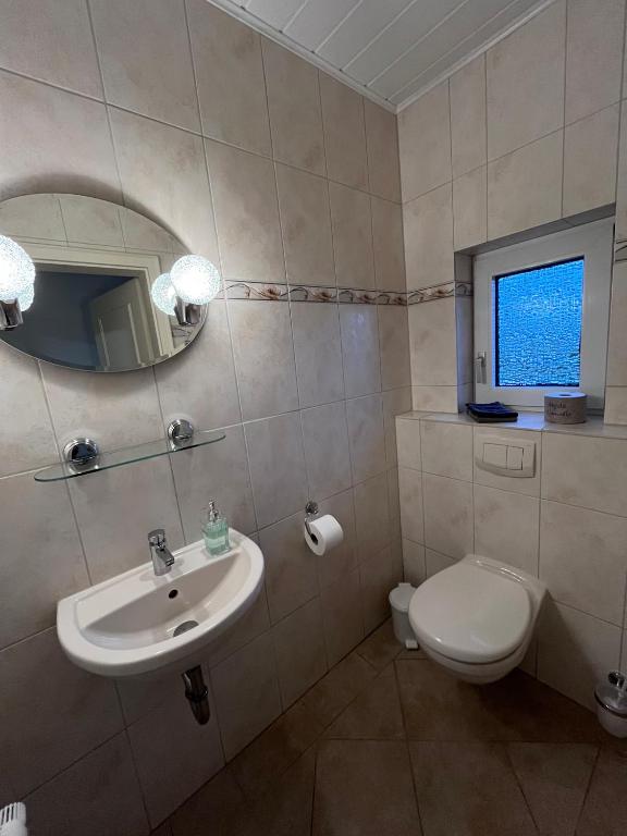 Koupelna v ubytování Ferienhaus Sonnendeich