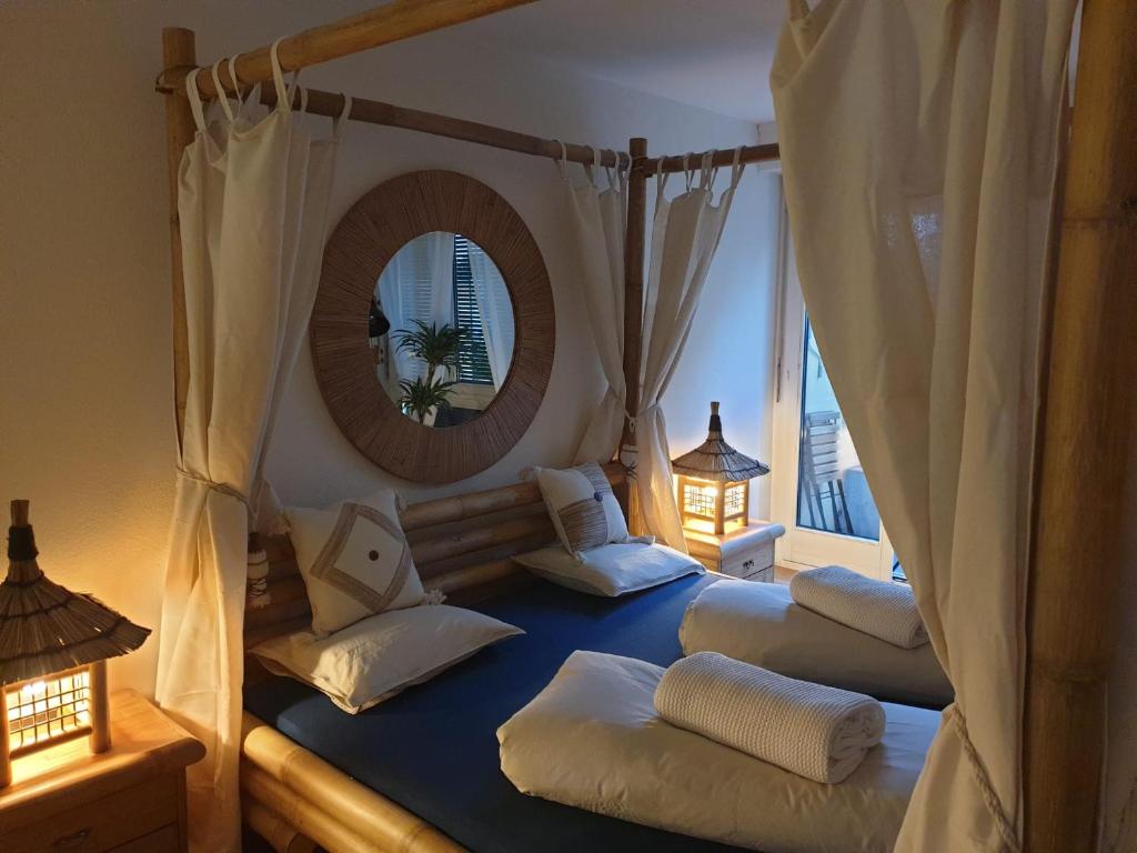 Postel nebo postele na pokoji v ubytování El Destino Apartments