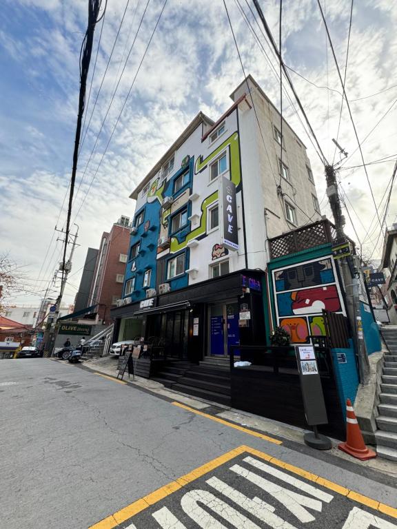 a building on the side of a city street at Cave Myeongdong in Seoul