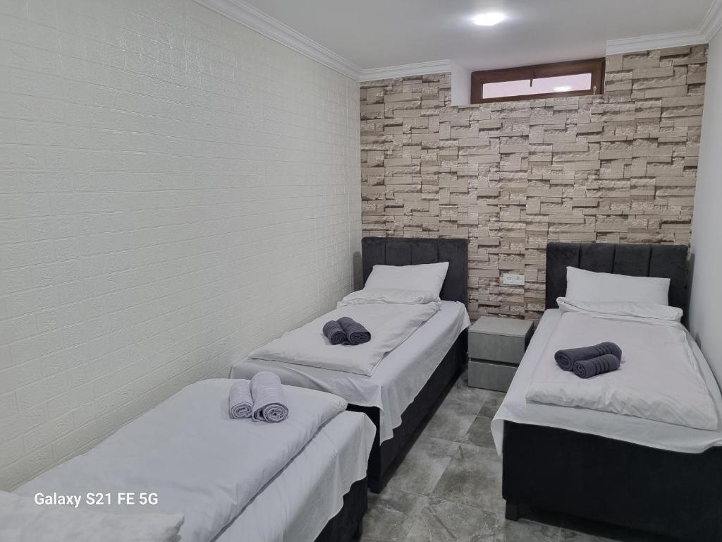Postel nebo postele na pokoji v ubytování EKA House