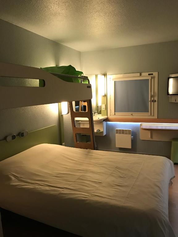 Voodi või voodid majutusasutuse ibis budget L'Isle Adam toas