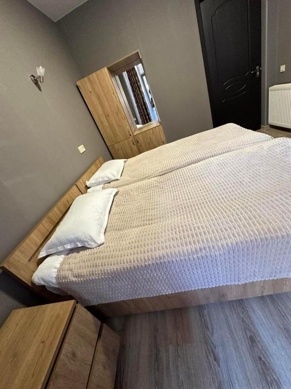 Postel nebo postele na pokoji v ubytování Memory- borjomi