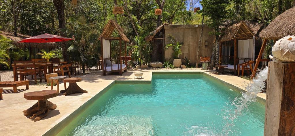 Bazén v ubytování Hotel Kin Tulum Jungle Deluxe nebo v jeho okolí