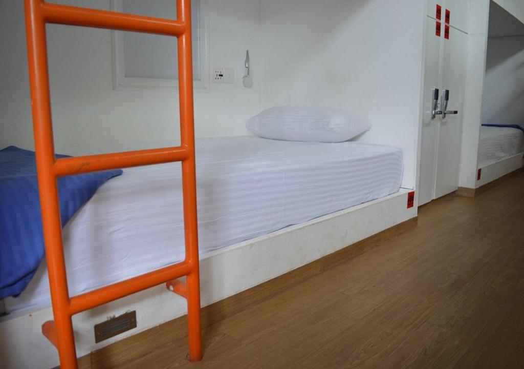 Postel nebo postele na pokoji v ubytování Traveler's Haven Hostel at Colombo Intl Airport