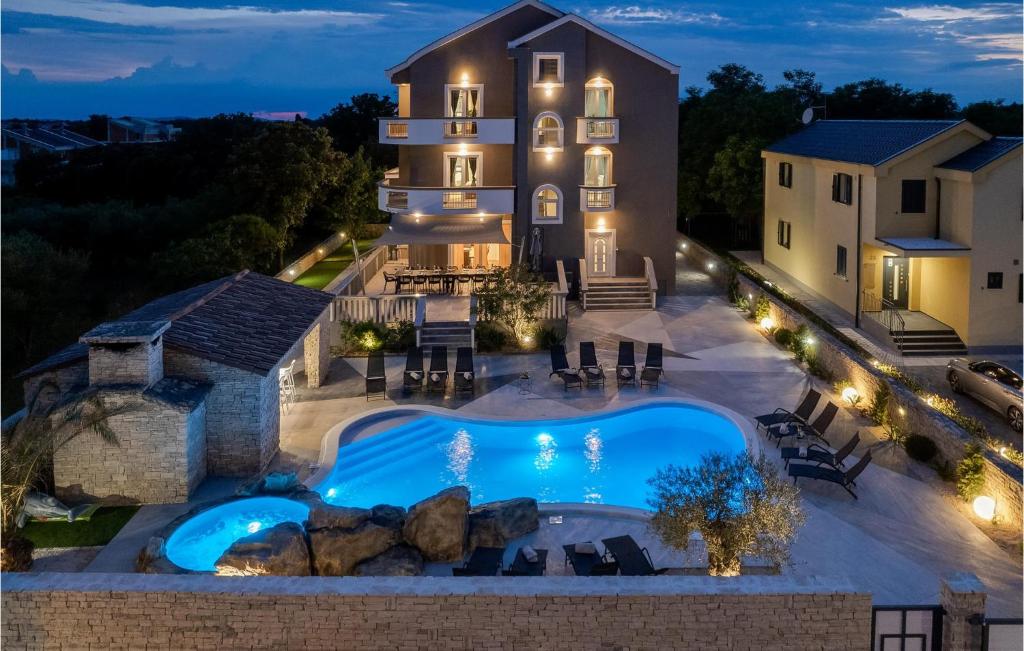 an aerial view of a house with a swimming pool at Villa Lea in Zaton