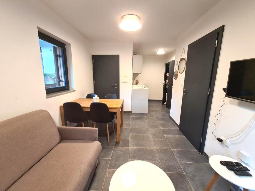 Televiisor ja/või meelelahutuskeskus majutusasutuses Alpine Escape Golte Apartment