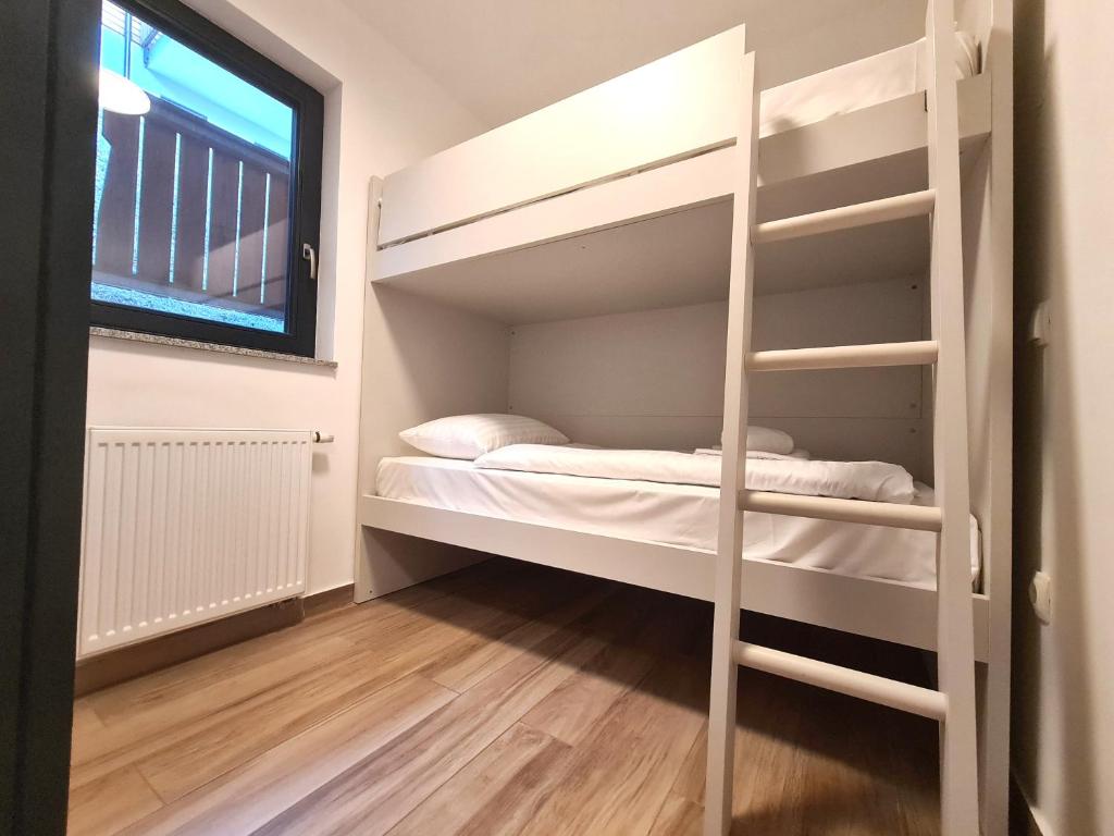 Voodi või voodid majutusasutuse Alpine Escape Golte Apartment toas