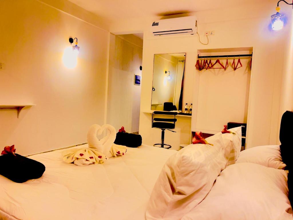 Postel nebo postele na pokoji v ubytování Sunnyside Inn Thoddoo