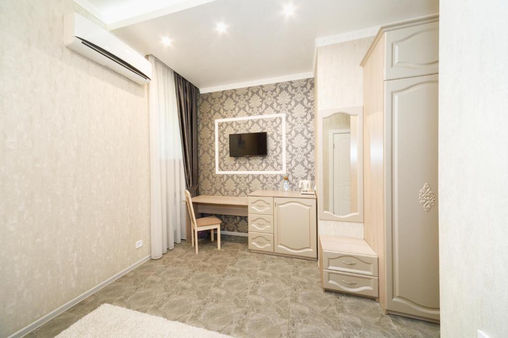 Postel nebo postele na pokoji v ubytování L.O.Y Family Hotel