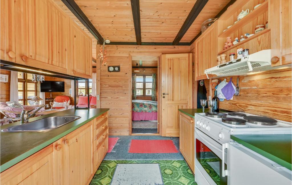 Kuchyň nebo kuchyňský kout v ubytování Hoejris Hus