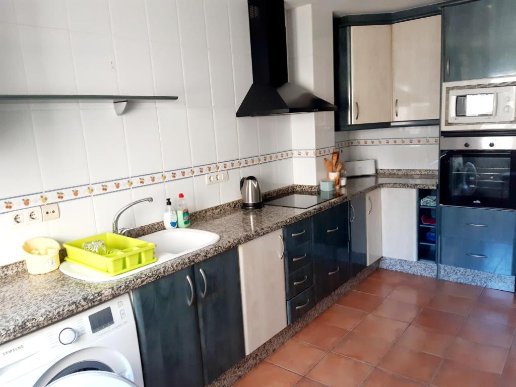 Kuchyň nebo kuchyňský kout v ubytování Apartamento Vernissa