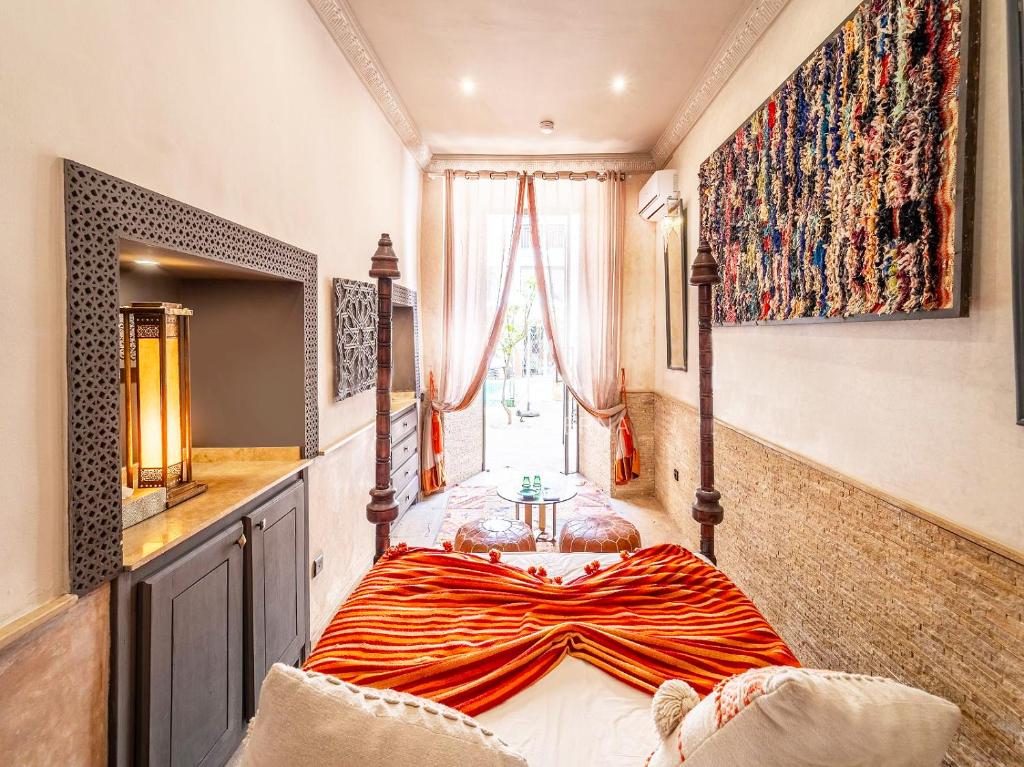 Postel nebo postele na pokoji v ubytování Le Medina Privilège Riad & Spa