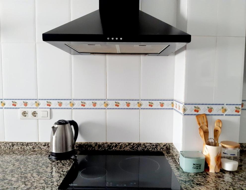 Kuchyň nebo kuchyňský kout v ubytování Apartamento Vernissa