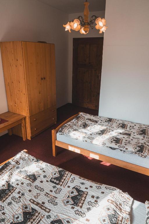 Postel nebo postele na pokoji v ubytování Vila Anobis