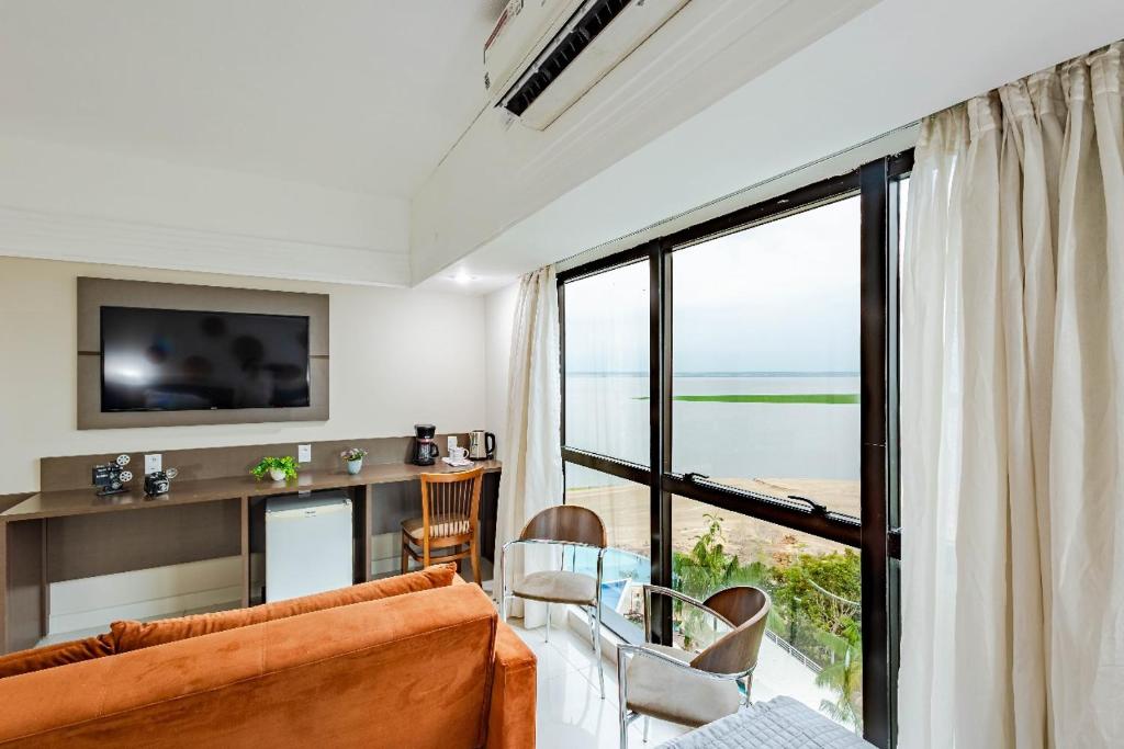 TV a/nebo společenská místnost v ubytování 710 Conforto com vista maravilhosa para o Rio