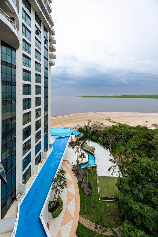 Bazén v ubytování 710 Conforto com vista maravilhosa para o Rio nebo v jeho okolí