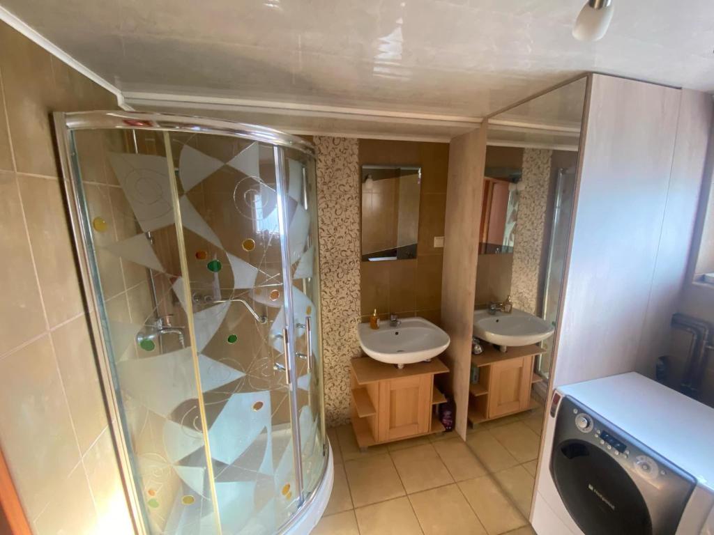 Kúpeľňa v ubytovaní Apartament na Ustrzyckiej
